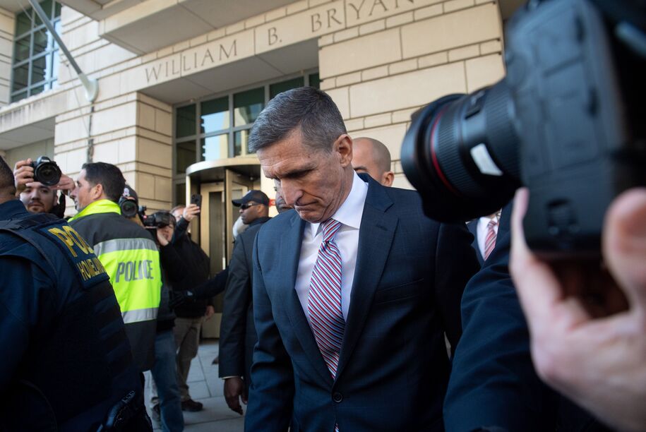 Former National Security Advisor General Michael Flynn leaves after the delay in  his sentencing hearing at US District Court in Washington, DC, December 18, 2018. - President Donald Trump's former national security chief Michael Flynn received a postponement of his sentencing after an angry judge threatened to give him a stiff sentence. Russia collusion investigation head Robert Mueller had proposed Flynn receive no jail time for lying to investigators about his Moscow ties. But Judge Emmet Sullivan said Flynn had behaved in a 'traitorous' manner and gave the former three-star general the option of receiving a potentially tough prison sentence now -- or wait until Mueller's investigation was closer to being completed to better demonstrate his cooperation with investigators. (Photo by SAUL LOEB / AFP)        (Photo credit should read SAUL LOEB/AFP via Getty Images)