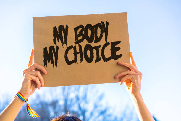 A woman holding a sign in favor of the legalization of abortion. Protest not to make abortion illegal in the united states, pro-choice, pro-life