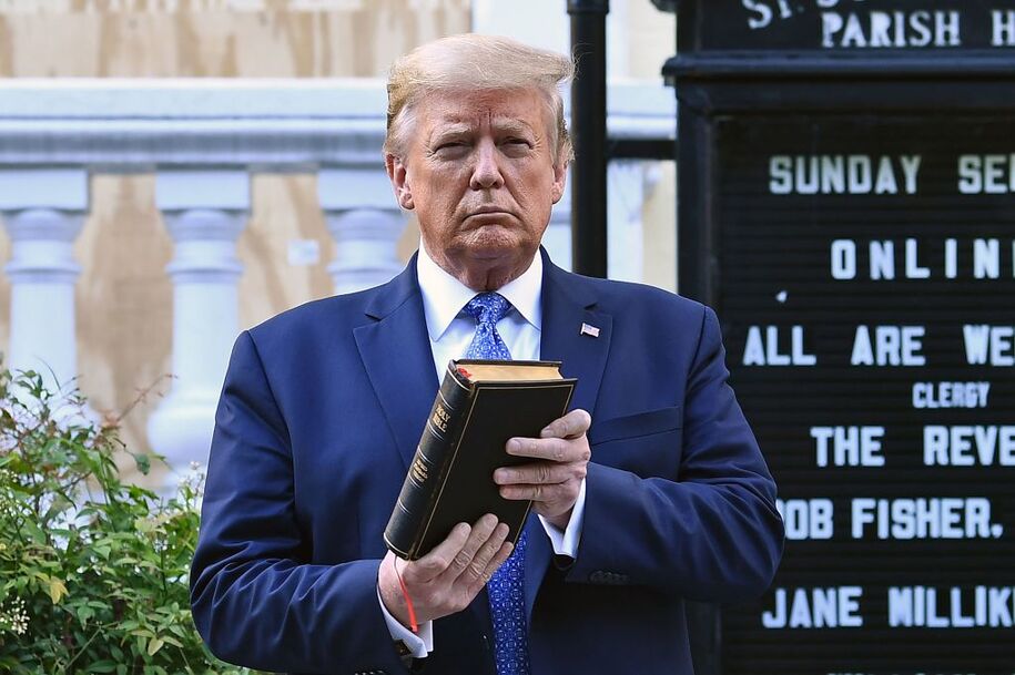 US President Donald Trump holds up a Bible outside of St John's Episcopal church across Lafayette Park in Washington, DC on June 1, 2020. - US President Donald Trump was due to make a televised address to the nation on Monday after days of anti-racism protests against police brutality that have erupted into violence..The White House announced that the president would make remarks imminently after he has been criticized for not publicly addressing in the crisis in recent days. (Photo by Brendan Smialowski / AFP) (Photo by BRENDAN SMIALOWSKI/AFP via Getty Images)