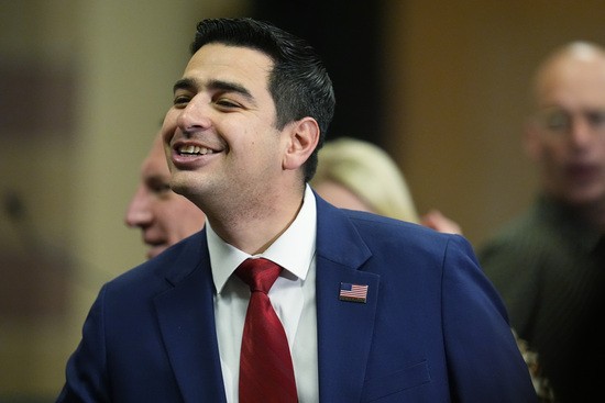 Colorado State Rep. Gabe Evans greets well-wishers before the first Republican primary debate for the 8th Congressional district seat Thursday, Jan. 25, 2024, in Fort Lupton, Colo. (AP Photo/David Zalubowski)
