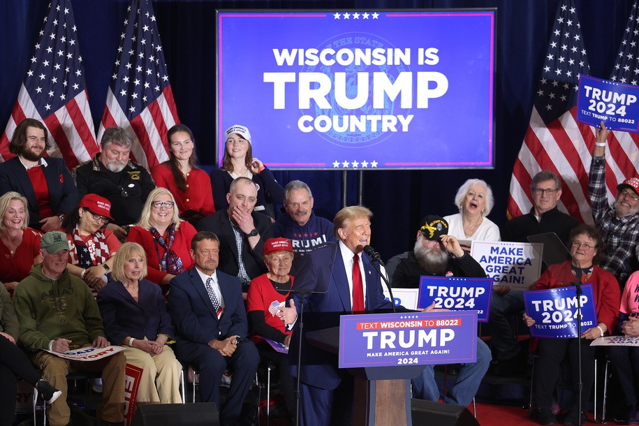 GREEN BAY, WISCONSIN - APRIL 02: Former President Donald Trump speaks to guests at a rally on April 02, 2024 in Green Bay, Wisconsin.  At the rally, Trump spoke next to an empty lectern on the stage and challenged President Joe Biden to debate him. The Wisconsin primary is being held today. (Photo by Scott Olson/Getty Images)