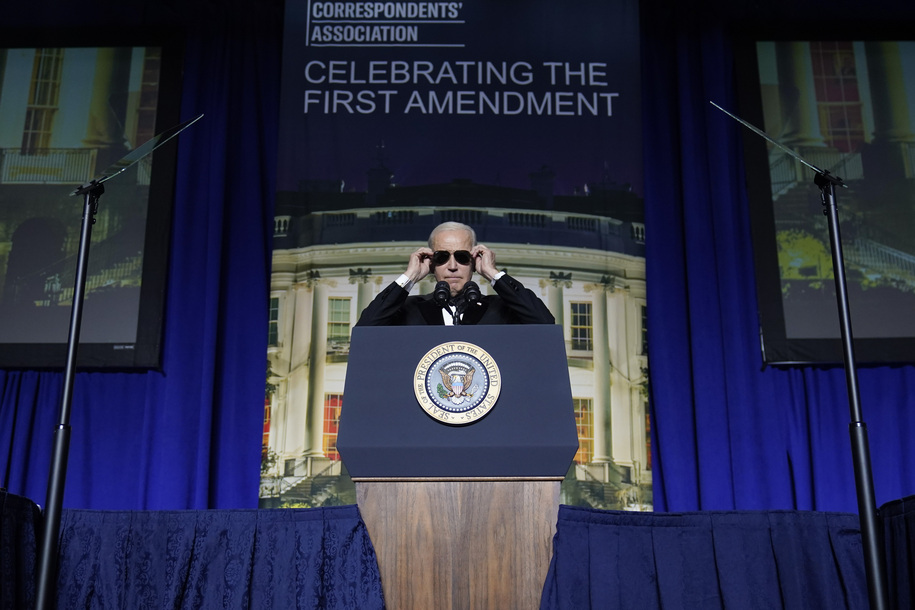 FILE - President Joe Biden puts on sunglasses after making a joke about becoming the 'Dark Brandon' persona during the White House Correspondents' Association dinner at the Washington Hilton in Washington, April 29, 2023. Both presidential campaigns this year have embraced digital memes, the lingua franca of social media. (AP Photo/Carolyn Kaster, File)