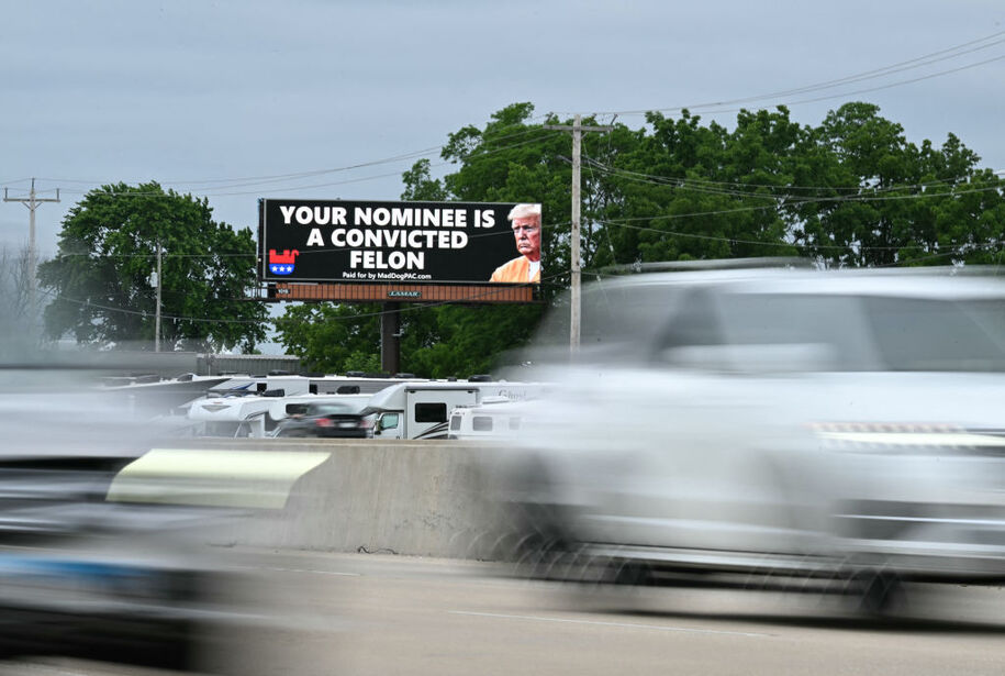 An electronic billboard displays a political message near Sylvania, Wisconsin, on June 18, 2024. Former US President and 2024 presidential candidate Donal Trump is speaking at a campaign event in Racine, Wisconsin. (Photo by Jim WATSON / AFP) (Photo by JIM WATSON/AFP via Getty Images)