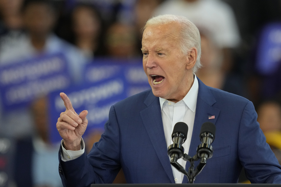 President Joe Biden gestures during his remarks at Renaissance High School during a Friday, July 12, 2024, campaign event in Detroit. (AP Photo/Carlos Osorio)