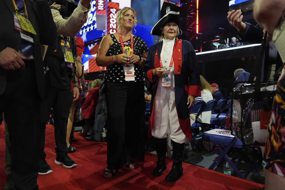 Delegates wait for the evening session of the Republican National Convention Monday, July 15, 2024, in Milwaukee. (AP Photo/Julia Nikhinson)