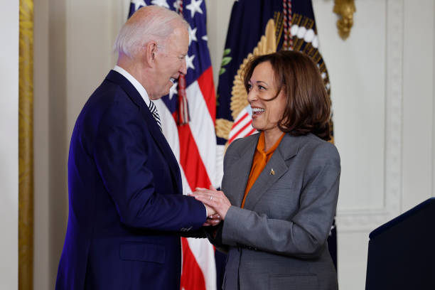 WASHINGTON, DC - OCTOBER 30: U.S. Vice President Kamala Harris introduces President Joe Biden during an event about their administration's work to regulate artificial intelligence in the East Room of the White House on October 30, 2023 in Washington, DC. President Biden issued a new executive order on Monday, directing his administration to create a new chief AI officer, track companies developing the most powerful AI systems, adopt stronger privacy policies and 'both deploy AI and guard against its possible bias,' creating new safety guidelines and industry standards. (Photo by Chip Somodevilla/Getty Images)