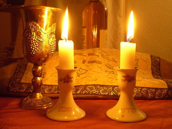 Shabat Candles, kiddush cup, challah cover.