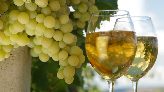 two-glasses-of-white-wine-and-bunch-of-muscat-white-grapes_eoxov2ffol__F0000.png