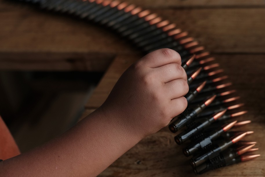 GREELEY, PENNSYLVANIA - OCTOBER 12: A child loads bullets at a shooting range during the â€œRod of Iron Freedom Festivalâ€ on October 12, 2019 in Greeley, Pennsylvania. The two-day event, which is organized by Kahr Arms/Tommy Gun Warehouse and Rod of Iron Ministries, has billed itself as a â€œsecond amendment rally and celebration of freedom, faith and family.â€ Numerous speakers, vendors and displays celebrated guns and gun culture in America.  (Photo by Spencer Platt/Getty Images)